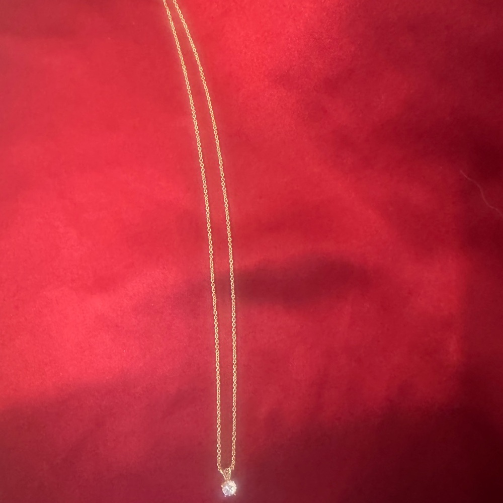 Elegant Gold Necklace with Crystal Pendant